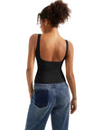 Black backless tank top with wide straps, paired with blue jeans, ideal for women's activewear or casual wear