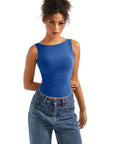 Royal blue sleeveless bodysuit paired with high-waist jeans, perfect for casual or activewear styles.