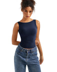 Navy blue sleeveless bodysuit with square neckline, paired with high-waisted jeans for women's fashion