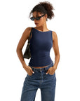 Navy blue sleeveless crop top with high-waisted jeans, stylish women's fashion outfit